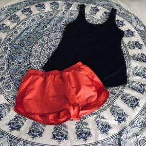 Nike pink/red running shorts